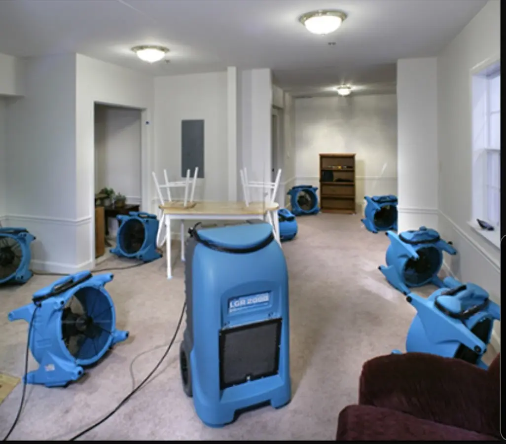 Air movers and dehumidifier setup for Water Damage Restoration in Salisbury